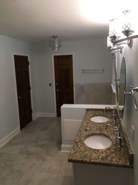 Tile flooring in new bathroom remodel